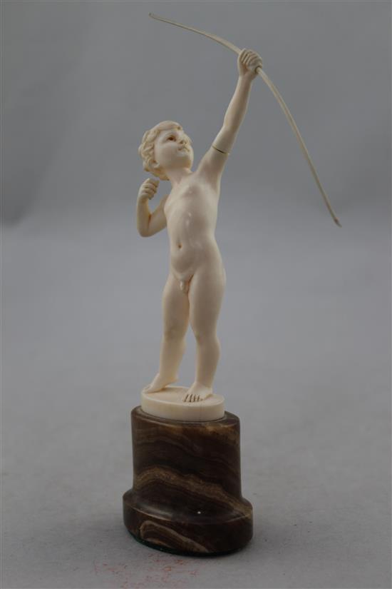 Ferdinand Preiss (German, 1882-1943). An Art Deco carved ivory figure of a young boy archer, 8in.